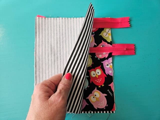 Lining fabric piece on top of zipper right sides together