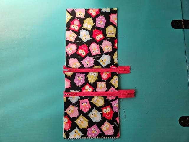 Cell phone purse zipper closure attached