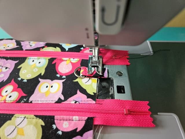 Baste the short straps to the outer fabric piece