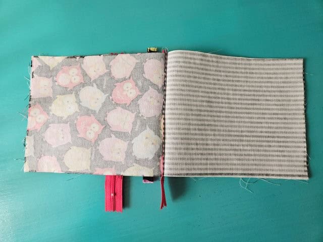 Fold the cell phone bag so the outer fabric pieces and lining fabric pieces are right sides together