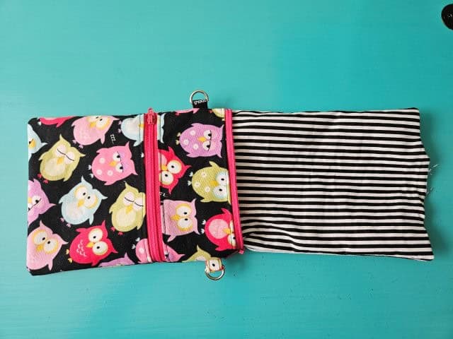 Turn the cell phone case right side out