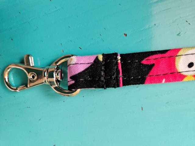 Picture of the swivel hook attached to the long strap