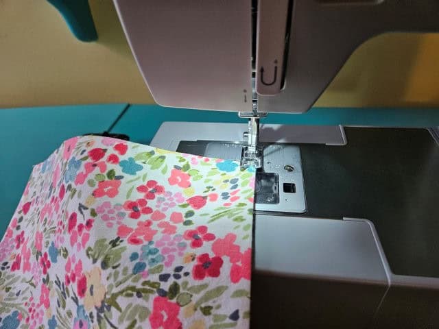 Top stitch along the top of the pocket