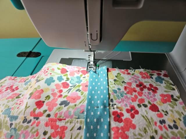 Sew along each edge of the accent strips