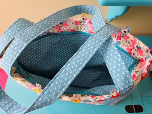 Use clips around the top of the bag before top stitching