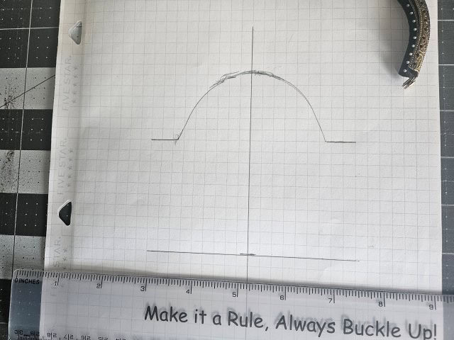 Mark the desired height of the metal coin purse