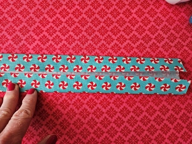 Fold other side of strap to center