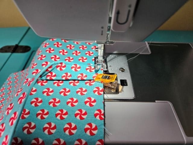 Baste the straps to the outer fabric pieces