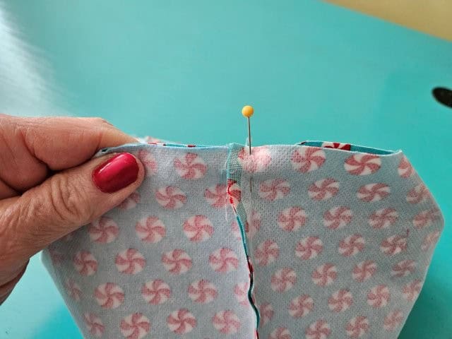 Pinch the bottom squares and line up the seams