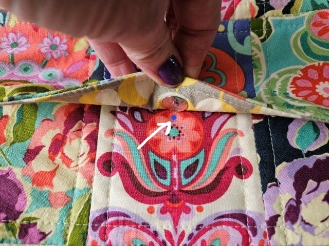 Fold the flap over and mark the spot for the snap