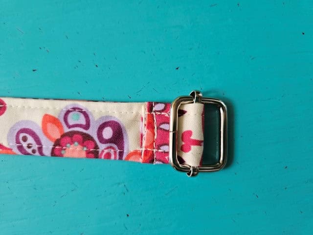 Picture of the slide attached to the strap