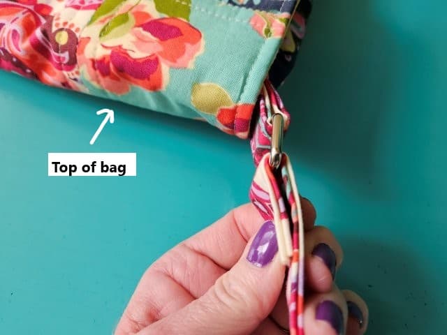 Fold the strap over the ring