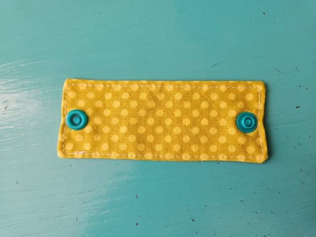 Cord strap with snaps attached