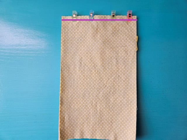 Sew along the top of the travel case