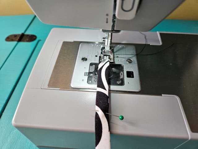 Sew both sides of the strap lengthwise