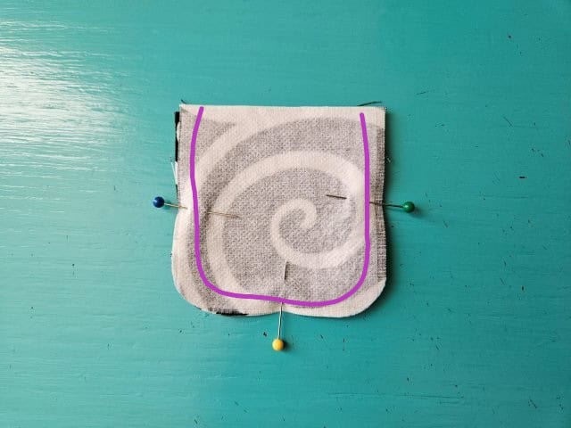 Sew along the sides and bottom, leaving the top open