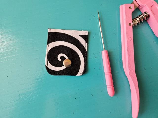 Attach the snap to the snap closure strap