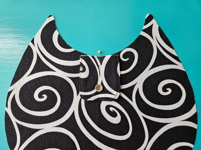 Strap in the center of the fabric