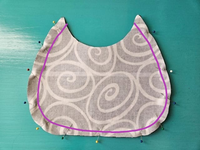 Sew around the sides and bottom of the bag