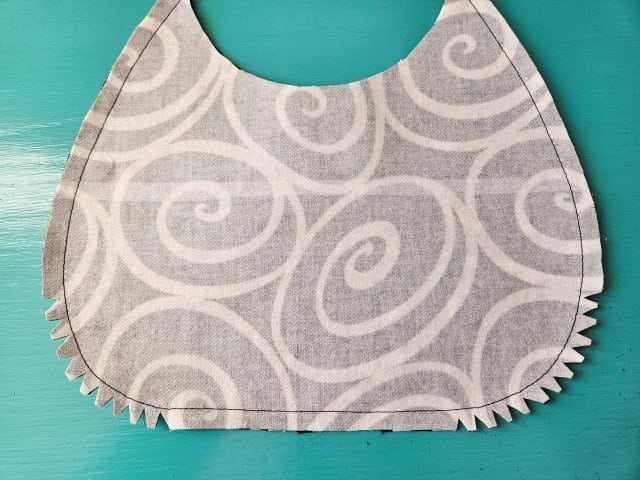 Cut little triangles around the curves