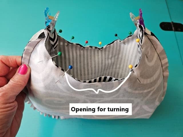 Pin around the top of the shoulder bag