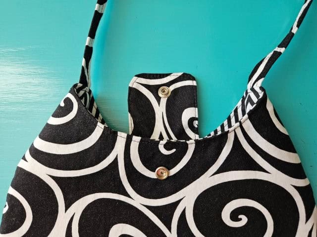 Snap attached to the front of the bag