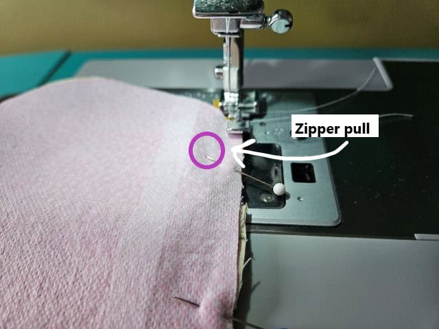Zipper pull placement