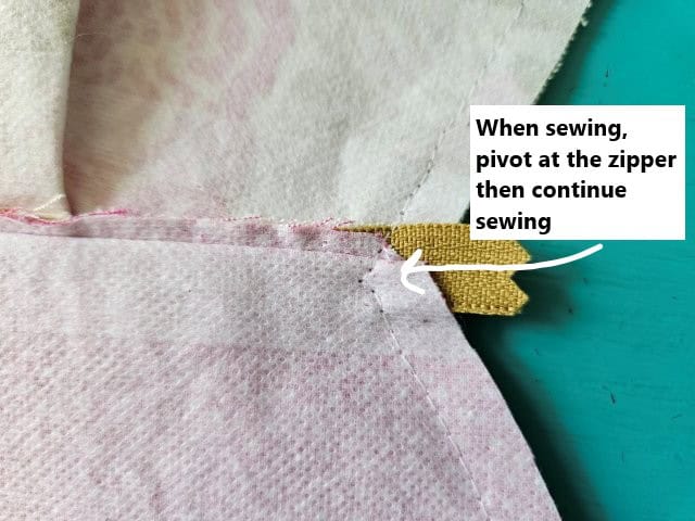 Pivot at the zipper then continue sewing