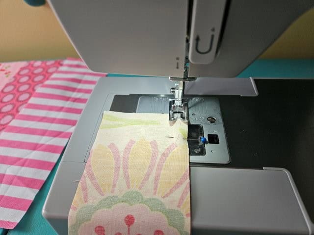 Sewing the fabric strips together