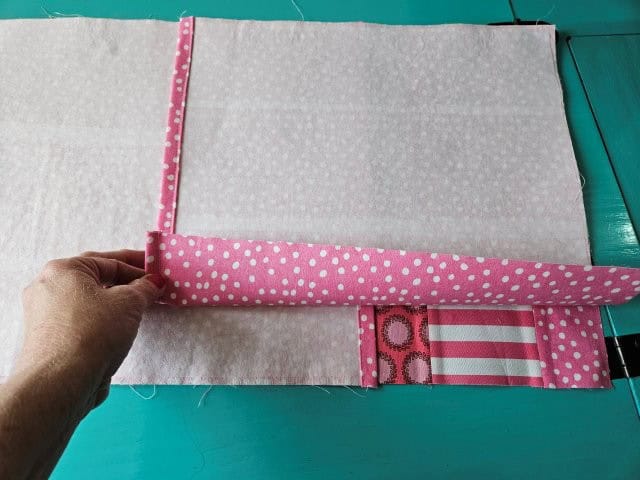 Place the other back fabric piece on top, right sides together