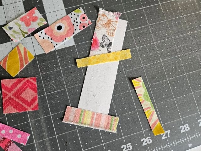 Place fabric pieces onto the bookmark