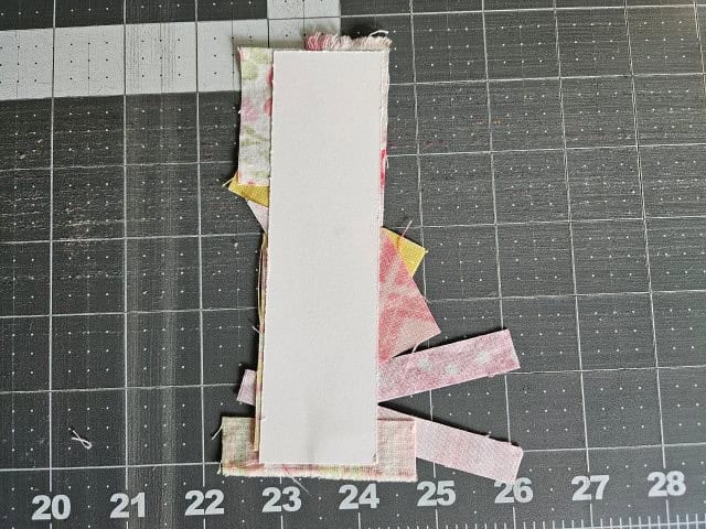 Turn over the bookmark and trim the fabric