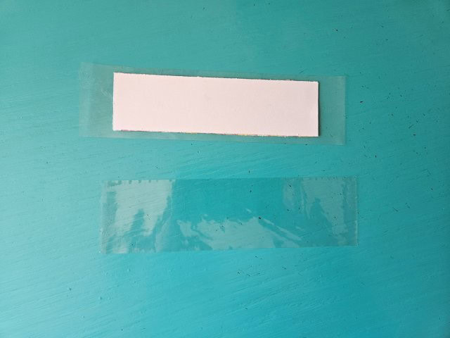 Cut another piece of tape for the other side of the bookmark