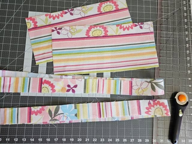 Fabric pieces for the backpack straps and inside slip pockets
