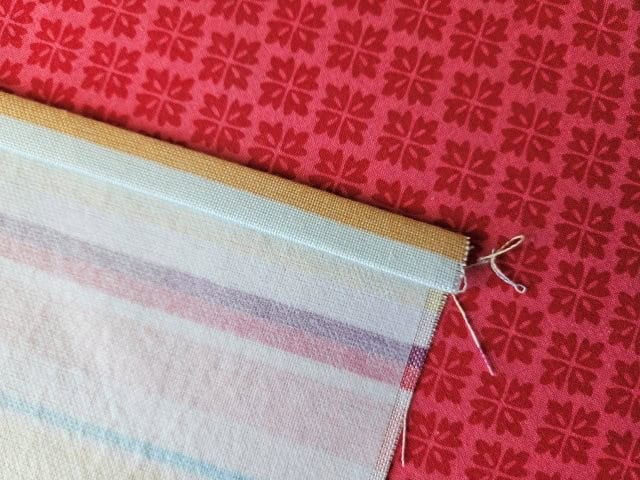 Fold over again and press