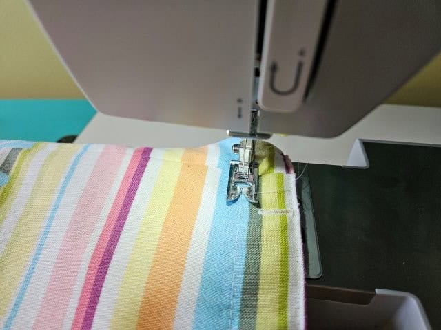 Sew around the top under the holes