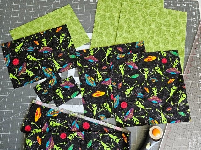 Quilted messenger bag cut fabric pieces