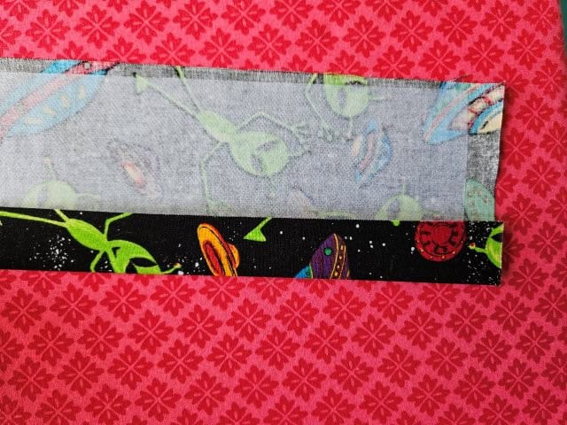 Fold the strap to the center crease