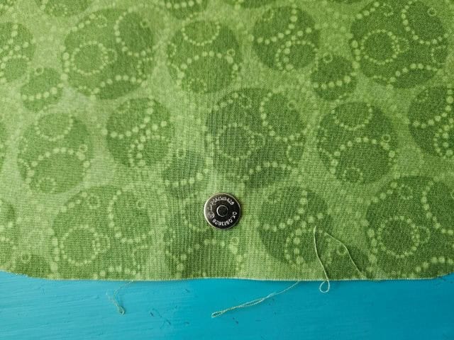 Magnetic snap attached to the flap cover