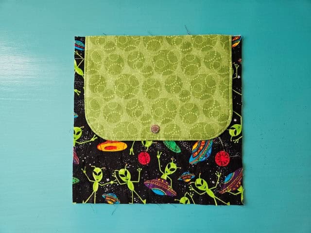 Placement of the flap cover on bag