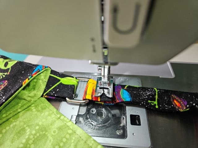 Sew the strap to attach to the ring