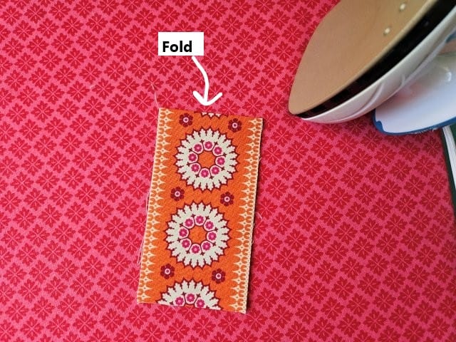 Press along the fold