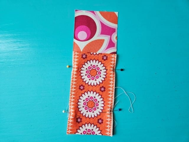 Pin the bookmark pen holder pocket fabric piece to hold in place