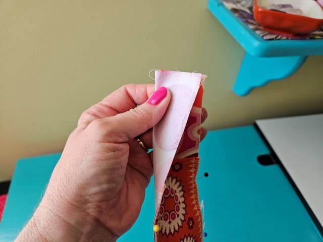 Fold the bookmark pen holder in half to find the center