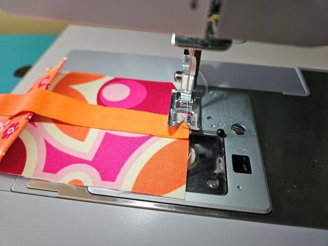 Baste the elastic to the bookmark