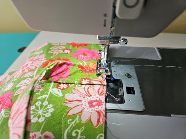 Baste the side strap to the fabric