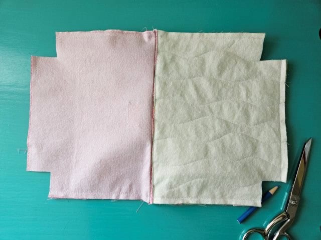 Cut the squares at each corner