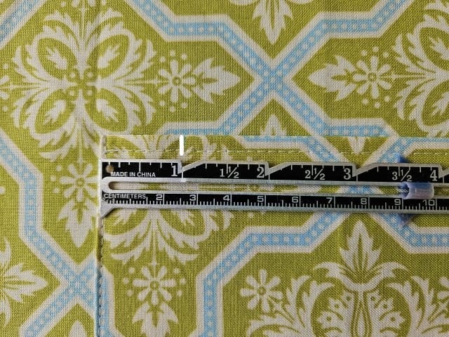 One inch from the previous stitches