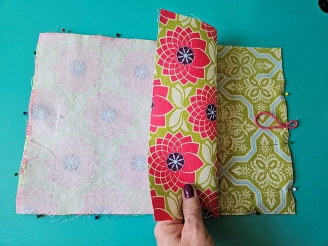 Outer fabric piece on top of lining fabric piece right sides together