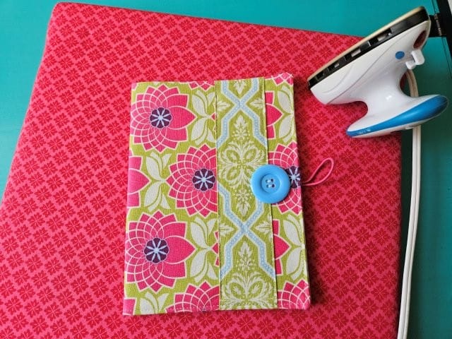 Fold the notepad holder in half and press the fold